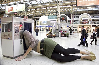 A giant female figure was spraweled across the concourse at Victoria Station