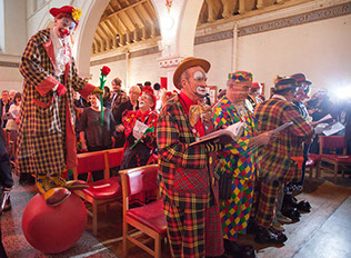 Clowns attend an annual church service in memory of Joseph Grimaldi